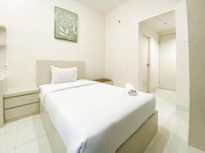 Minimalist and Homey Studio Room at Amartha View Apartment By Travelio